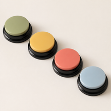 Four colorful Arelio TalkButton recordable pet communication buttons